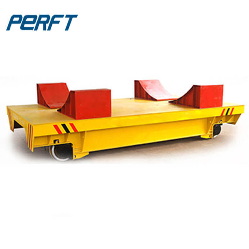 industrial motorized material handling cart with rail guides 